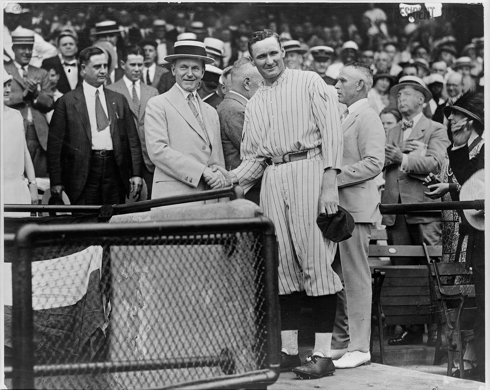 President Coolidge shaking hands with Walter Johnson at Griffith Stadium LCCN96522735
