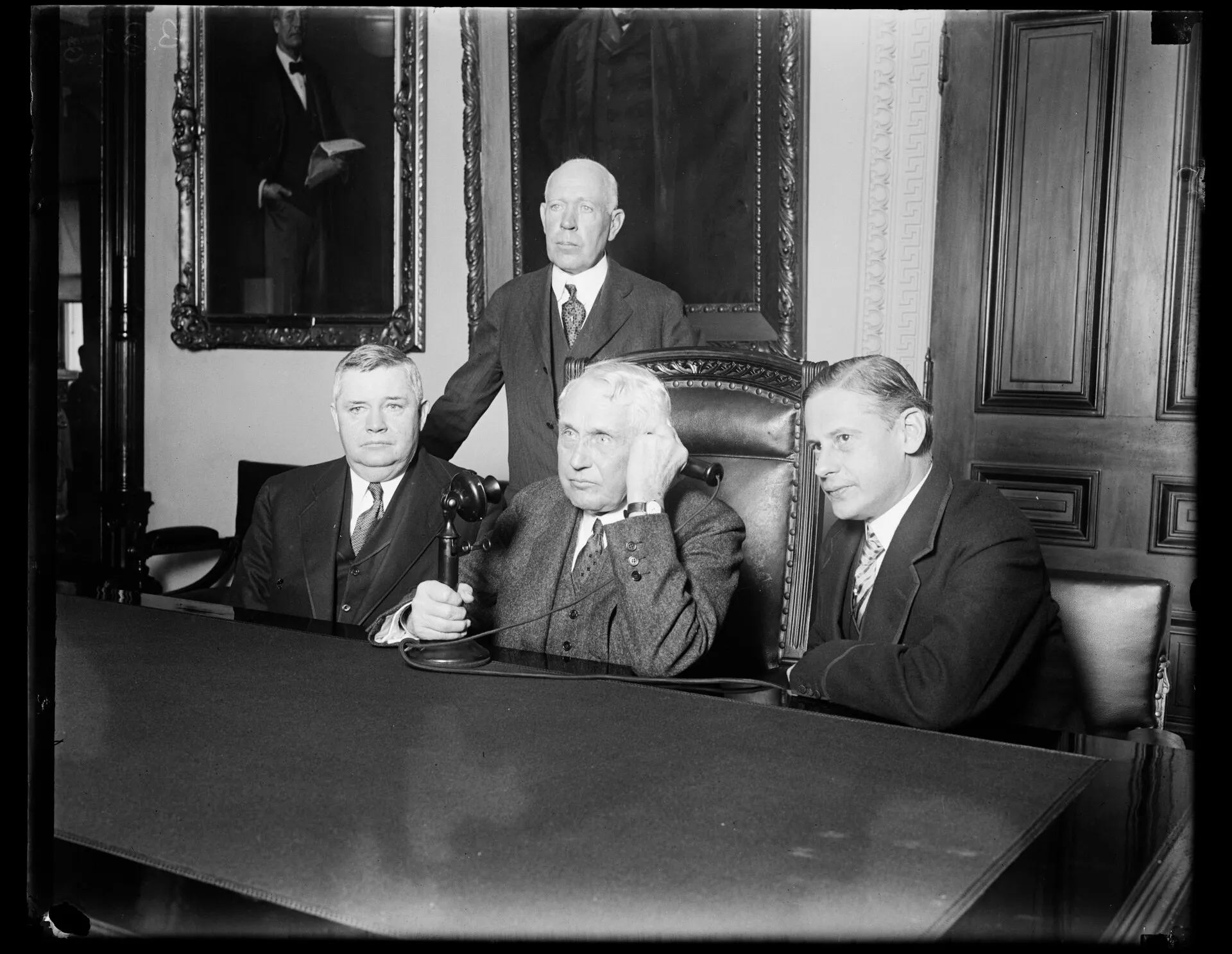 Telephone communication to Austria from United States is established (Secretary of State Frank B. Kellogg on the telephone), 1928